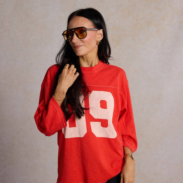 Gold Football & Bow Drop Studs