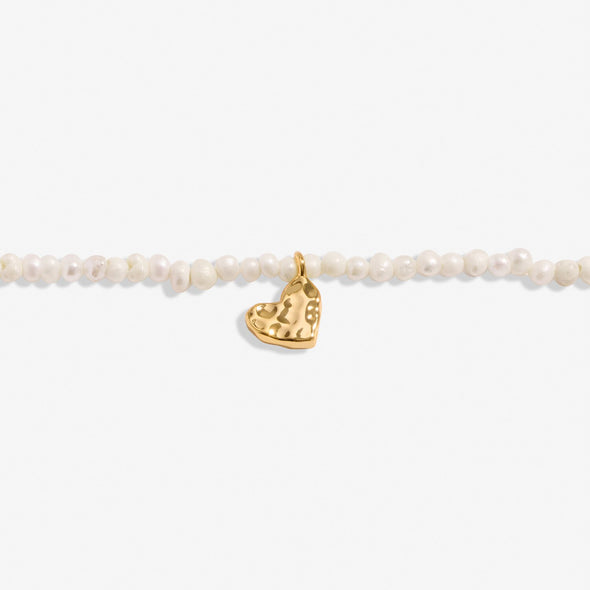 Mini Charms Natural Matte Pearl Heart Bracelet In Gold-Tone Plating