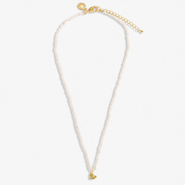 Mini Charms Natural Matte Pearl Heart Necklace In Gold-Tone Plating