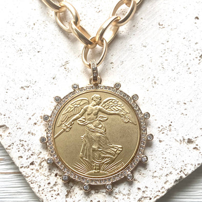 Chunky chain angel crystal coin necklace.